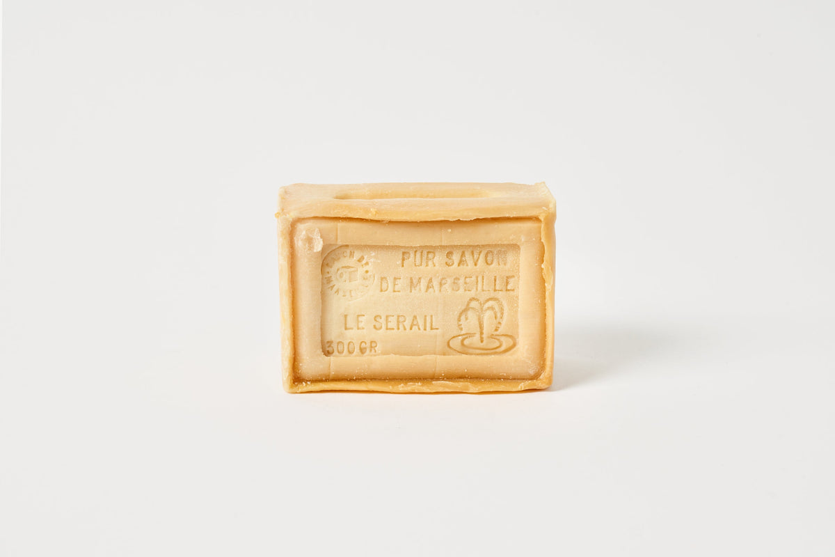 Bar of soap with branding on a white background