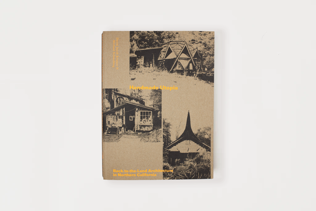 A book titled 'The Architecture of Shelter' by Peter C. Hodgson, featuring a textured beige cover with three black-and-white architectural photographs and yellow text, displayed on a clean white background.